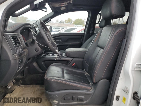 2023 Nissan Titan SV z VIN 1N6AA1ED7PN116504, wystawiony jako Copart lot #77986734 z przebiegiem 31 392 mil mil oraz Szkoda całkowita • Salvage title. Historia ofert i sprzedaży dostępna na DreamBid. Obrazek 7.