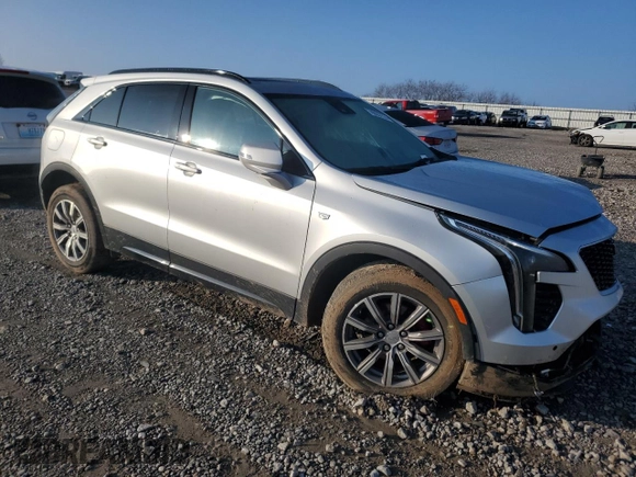 2021 Cadillac XT4 AWD Sport with VIN 1GYFZFR48MF007798, listed as a Copart auction lot 86557574 with 29,462 mi miles and Salvage title. Bid and sale history available at DreamBid. Image 4.