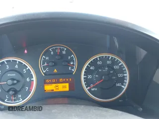 2008 Nissan Titan SE z VIN 1N6BA07D08N313205, wystawiony jako IAAI lot #42790513 z przebiegiem 154 131 mil mil oraz . Historia ofert i sprzedaży dostępna na DreamBid. Obrazek 7.