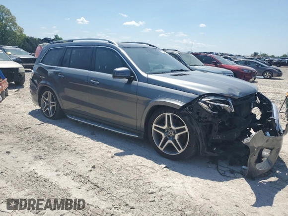 2018 Mercedes-Benz GLS 550 with VIN 4JGDF7DE7JB025977, listed as a Copart auction lot 54705295 with 82,065 mi miles and Salvage title. Bid and sale history available at DreamBid. Image 4.