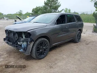 2015 Dodge Durango SXT with VIN 1C4RDJAG0FC947060, listed as a IAAI auction lot 42505938 with 124,705 mi miles and . Bid and sale history available at DreamBid. Image 2.