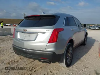 2017 Cadillac XT5 Luxury FWD with VIN 1GYKNBRS8HZ205769, listed as a IAAI auction lot 41865624 with 112,767 mi miles. Bid and sale history available at carsss.com. Image 4.