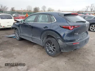 2022 Mazda CX-30 S with VIN 3MVDMBAL8NM411739, listed as a IAAI auction lot 41668265 with 34,964 mi miles and . Bid and sale history available at carsss.com. Image 3.