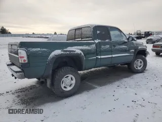2000 Dodge Ram 2500 with VIN 1B7KF2369YJ151573, listed as a Copart auction lot 83984894 with 213,974 mi miles and Salvage Title. Bid and sale history available at carsss.com. Image 3.