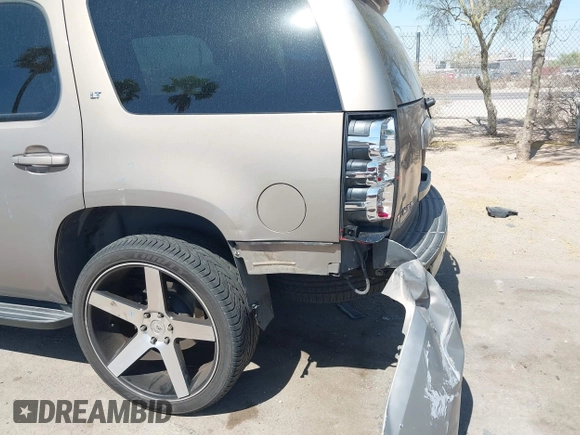 2007 Chevrolet Tahoe LT z VIN 1GNFC13077R226276, wystawiony jako IAAI lot #42232796 z przebiegiem 169 595 mil mil oraz . Historia ofert i sprzedaży dostępna na DreamBid. Obrazek 13.