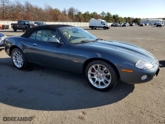 2001 Jaguar XK8 with VIN SAJDA42B91PA15291, listed as a Copart auction lot 80018934 with 68,009 mi miles and Salvage Title. Bid and sale history available at carsss.com. Image 4.