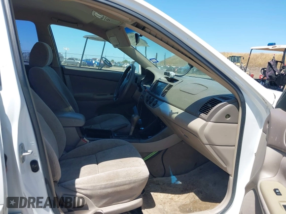 2002 Toyota Camry LE z VIN 4T1BE32K82U038819, wystawiony jako IAAI lot #42301111 z przebiegiem 189 166 mil mil oraz . Historia ofert i sprzedaży dostępna na DreamBid. Obrazek 5.