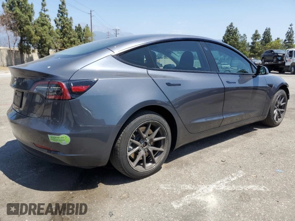 2023 Tesla Model 3 with VIN 5YJ3E1EA4PF615975, listed as a Copart auction lot 58845405 with 38,927 mi miles and Salvage title. Bid and sale history available at DreamBid. Image 3.