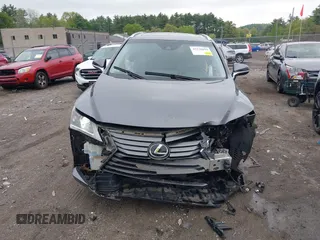 2016 Lexus RX 350 z VIN 2T2BZMCA1GC001812, wystawiony jako IAAI lot #42278639 z przebiegiem 69 648 mil mil oraz . Historia ofert i sprzedaży dostępna na DreamBid. Obrazek 13.
