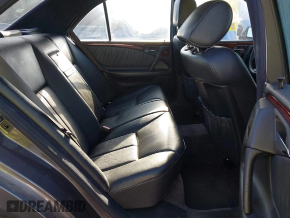 1997 Mercedes-Benz E 320 with VIN WDBJF55F7VA402305, listed as a IAAI auction lot 41865470 with 210,577 mi miles and . Bid and sale history available at DreamBid. Image 8.
