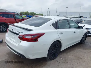 2018 Nissan Altima SR with VIN 1N4AL3AP3JC290863, listed as a IAAI auction lot 41933628 with 121,771 mi miles and . Bid and sale history available at carsss.com. Image 4.