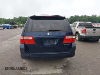 2005 Honda Odyssey EX-L with VIN 5FNRL38725B001662, listed as a IAAI auction lot 42693301 with 161,114 mi miles and . Bid and sale history available at DreamBid. Image 15.