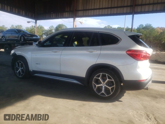 2017 BMW X1 sDrive28i with VIN WBXHU7C31H5H37217, listed as a Copart auction lot 70114342 with 73,683 mi miles. Bid and sale history available at carsss.com. Image 2.