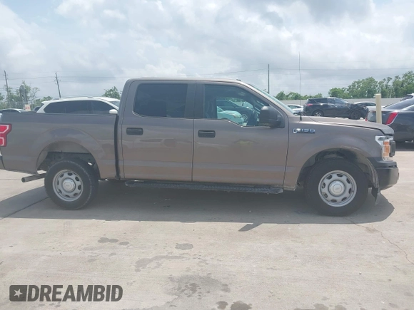 2019 Ford F-150 XL z VIN 1FTEW1CP2KKE83484, wystawiony jako IAAI lot #42057244 z przebiegiem 98 612 mil mil oraz . Historia ofert i sprzedaży dostępna na DreamBid. Obrazek 13.