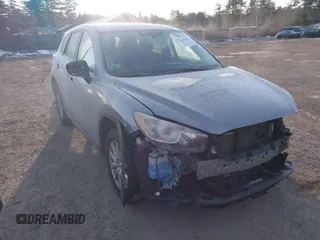 2015 Mazda CX-5 Touring with VIN JM3KE4CY3F0510846, listed as a IAAI auction lot 41280516 with 118,504 mi miles. Bid and sale history available at carsss.com. Image 1.