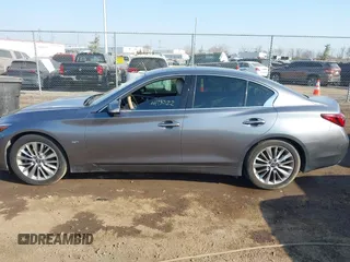 2019 Infiniti Q50 3.0t LUXE with VIN JN1EV7AP7KM513059, listed as a IAAI auction lot 41737122 with 77,337 mi miles. Bid and sale history available at carsss.com. Image 14.