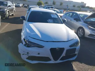 2019 Alfa Romeo Giulia z VIN ZARFAMAN5K7622490, wystawiony jako IAAI lot #41403496 z przebiegiem Nie podano mil oraz . Historia ofert i sprzedaży dostępna na DreamBid. Obrazek 12.