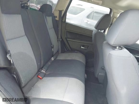 2010 Jeep Grand Cherokee Laredo with VIN 1J4PS4GK6AC136702, listed as a IAAI auction lot 42066484 with 126,509 mi miles. Bid and sale history available at carsss.com. Image 8.