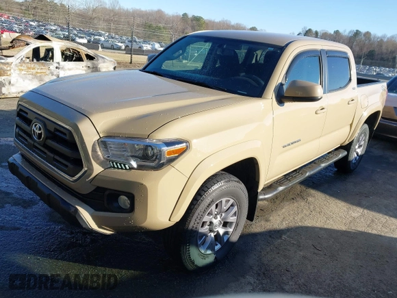 2017 Toyota Tacoma SR5 with VIN 3TMCZ5ANXHM088347, listed as a IAAI auction lot 41591318 with 103,800 mi miles and . Bid and sale history available at DreamBid. Image 2.