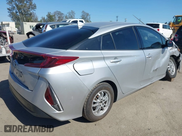 2017 Toyota Prius Plus with VIN JTDKARFP6H3021962, listed as a IAAI auction lot 42235283 with 168,233 mi miles and . Bid and sale history available at DreamBid. Image 4.