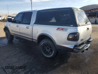 2002 Ford F-150 XLT with VIN 1FTRW08L12KA86849, listed as a Copart auction lot 77861574 with 0 mi miles and Salvage Title. Bid and sale history available at carsss.com. Image 2.