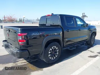 2024 Nissan Frontier SL with VIN 1N6ED1EJ4RN650125, listed as a IAAI auction lot 42193443 with 14,282 mi miles and . Bid and sale history available at DreamBid. Image 4.