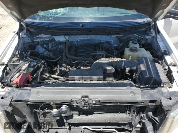 2013 Ford F-150 XL with VIN 1FTFW1EF8DFA22715, listed as a Copart auction lot 57919985 with 243,124 mi miles and Salvage title. Bid and sale history available at DreamBid. Image 11.