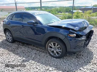 2021 Mazda CX-30 Premium with VIN 3MVDMBDL7MM236474, listed as a IAAI auction lot 42284515 with 58,565 mi miles and . Bid and sale history available at DreamBid. Image 1.