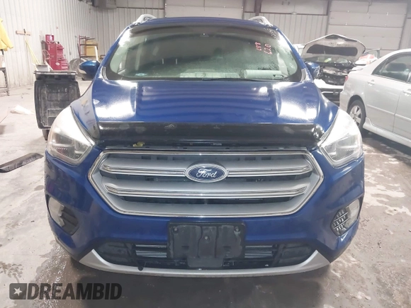 2018 Ford Escape Titanium with VIN 1FMCU9J99JUB94925, listed as a IAAI auction lot 42412800 with 95,880 mi miles and . Bid and sale history available at DreamBid. Image 13.