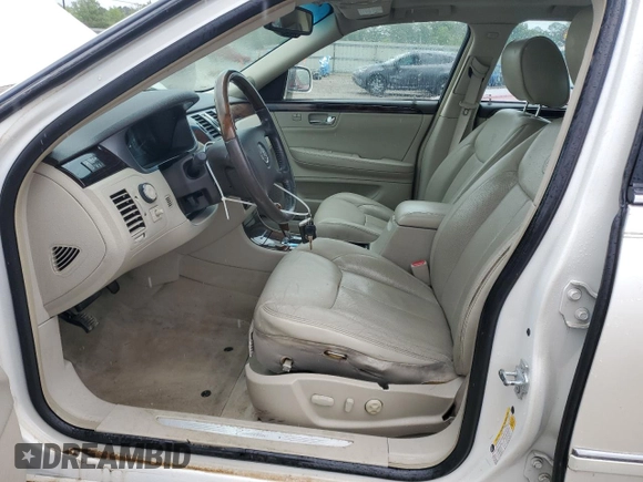 2011 Cadillac DTS Luxury Collection z VIN 1G6KD5E64BU121197, wystawiony jako Copart lot #58212335 z przebiegiem 141 055 mil mil oraz Szkody całkowita. Historia ofert i sprzedaży dostępna na DreamBid. Obrazek 7.
