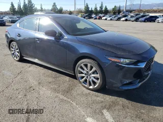 2020 Mazda 3 Premium with VIN JM1BPAEM4L1164114, listed as a Copart auction lot 83880834 with 25,590 mi miles and Salvage title. Bid and sale history available at DreamBid. Image 4.