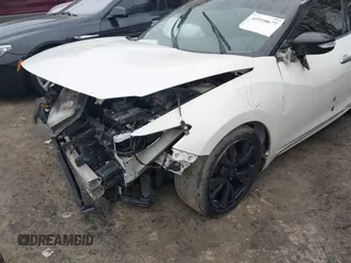 2017 Nissan Maxima Platinum with VIN 1N4AA6AP2HC412534, listed as a IAAI auction lot 41910678 with 140,675 mi miles and . Bid and sale history available at DreamBid. Image 18.