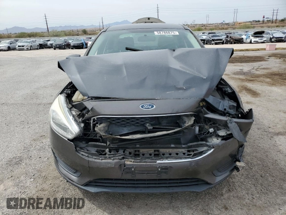 2017 Ford Focus S z VIN 1FADP3E21HL304026, wystawiony jako Copart lot #58786875 z przebiegiem 68 092 mil mil oraz Szkoda całkowita • Salvage title. Historia ofert i sprzedaży dostępna na DreamBid. Obrazek 5.