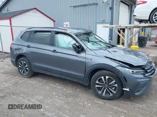 2024 Volkswagen Tiguan S with VIN 3VVFB7AX5RM188177, listed as a IAAI auction lot 41865699 with 7,823 mi miles and . Bid and sale history available at DreamBid. Image 1.
