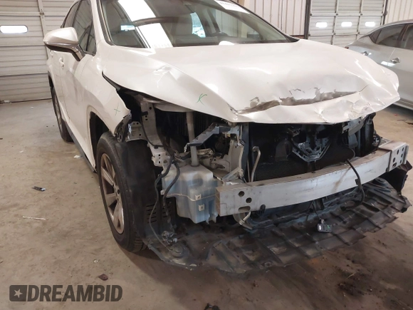 2018 Lexus RX 350 z VIN 2T2BZMCA5JC144530, wystawiony jako IAAI lot #41417396 z przebiegiem 97 860 mil mil oraz . Historia ofert i sprzedaży dostępna na DreamBid. Obrazek 17.