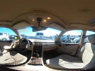 2001 Mercedes-Benz E-Class with VIN WDBJF65J11B368277, listed as a IAAI auction lot 41855716 with 207,864 mi miles. Bid and sale history available at carsss.com. Image 18.