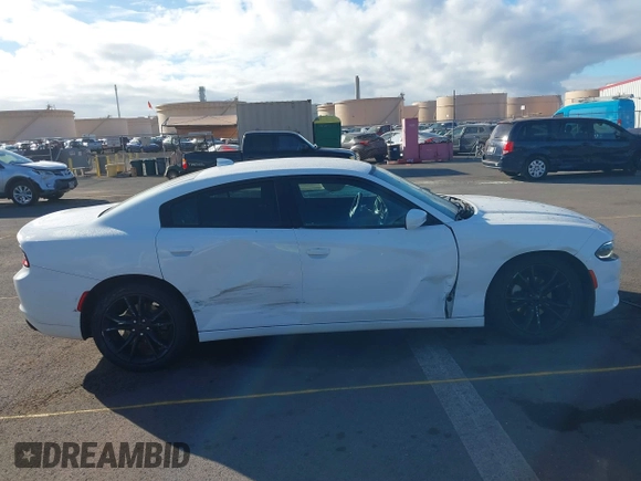 2015 Dodge Charger SXT z VIN 2C3CDXHG6FH847951, wystawiony jako IAAI lot #41094866 z przebiegiem 78 461 mil mil oraz . Historia ofert i sprzedaży dostępna na DreamBid. Obrazek 13.