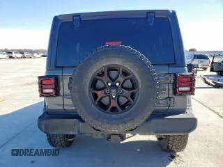 2021 Jeep Wrangler Unlimited Sport S with VIN 1C4HJXDG4MW699376, listed as a Copart auction lot 47202615 with 57,192 mi miles and Salvage Title. Bid and sale history available at DreamBid. Image 6.