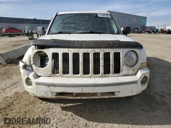 2010 Jeep Patriot Sport with VIN 1J4NF2GB2AD525475, listed as a Copart auction lot 51986785 with 90,659 mi miles and Salvage Title. Bid and sale history available at carsss.com. Image 5.