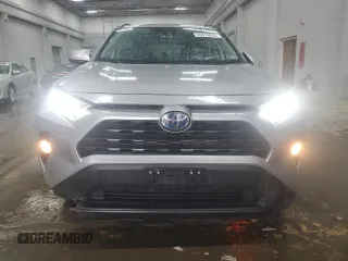 2020 Toyota RAV4 Hybrid XLE with VIN 2T3R6RFV1LW001235, listed as a Copart auction lot 56818635 with 105,234 mi miles and Salvage title. Bid and sale history available at DreamBid. Image 5.