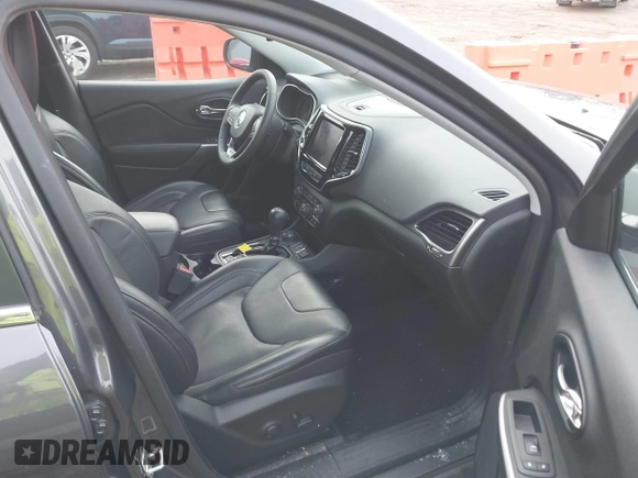2022 Jeep Cherokee Limited with VIN 1C4PJMDX2ND501286, listed as a IAAI auction lot 41196619 with 54,975 mi miles and . Bid and sale history available at DreamBid. Image 5.
