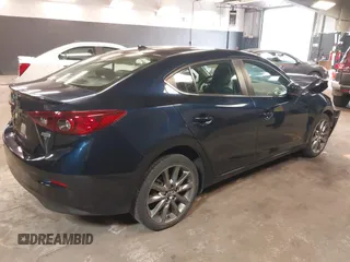 2018 Mazda 3 Touring with VIN 3MZBN1V30JM252166, listed as a IAAI auction lot 41828745 with 32,719 mi miles. Bid and sale history available at carsss.com. Image 4.