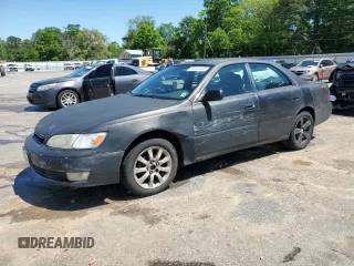 1997 Lexus ES 300 z VIN JT8BF22GXV0073766, wystawiony jako Copart lot #52463405 z przebiegiem 317 016 mil mil oraz Szkoda całkowita • Salvage title. Historia ofert i sprzedaży dostępna na DreamBid. Obrazek 1.