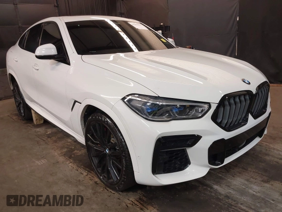 2022 BMW X6 M50i z VIN 5UXCY8C05N9J18577, wystawiony jako IAAI lot #41982042 z przebiegiem 64 155 mil mil oraz . Historia ofert i sprzedaży dostępna na DreamBid. Obrazek 1.