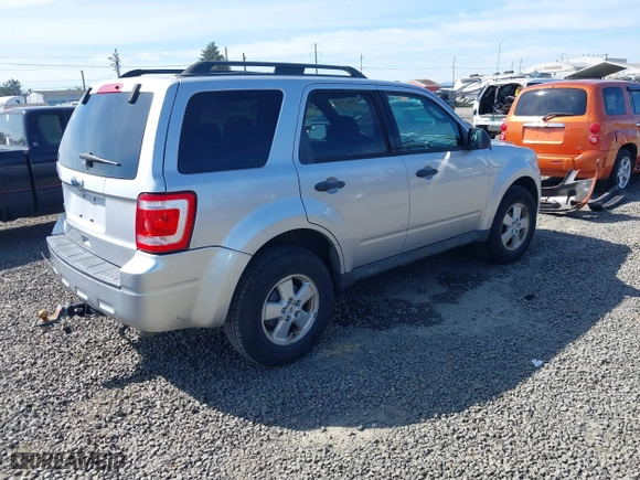 2010 Ford Escape XLT with VIN 1FMCU9D70AKD46774, listed as a IAAI auction lot 41857882 with 93,409 mi miles. Bid and sale history available at carsss.com. Image 4.
