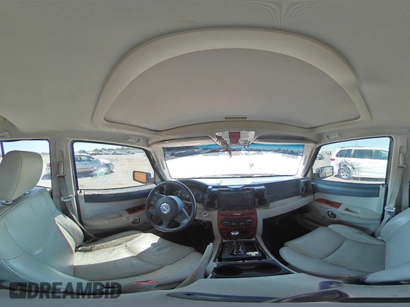 2006 Jeep Commander Limited z VIN 1J8HG582X6C171002, wystawiony jako Copart lot #62952795 z przebiegiem 221 626 mil mil oraz Szkoda całkowita • Salvage title. Historia ofert i sprzedaży dostępna na DreamBid. Obrazek 16.
