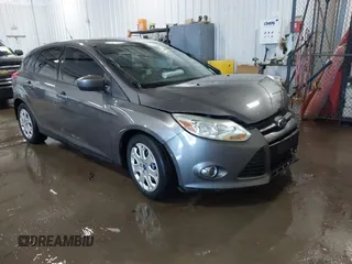 2012 Ford Focus SE z VIN 1FAHP3K2XCL139690, wystawiony jako IAAI lot #41306821 z przebiegiem 197 106 mil mil oraz . Historia ofert i sprzedaży dostępna na DreamBid. Obrazek 1.