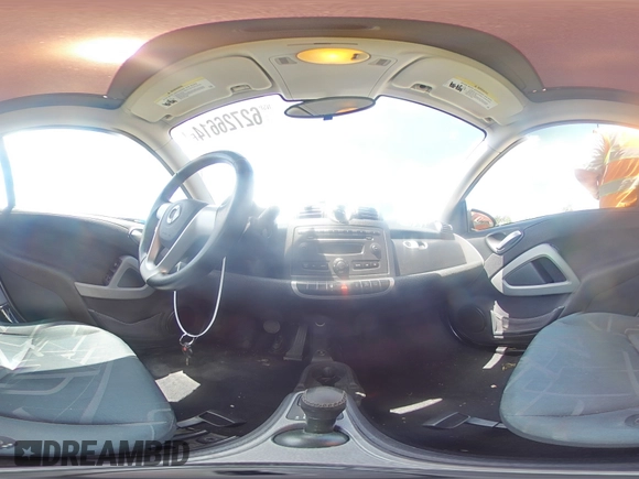 2010 Smart fortwo Pure z VIN WMEEJ3BA4AK342214, wystawiony jako Copart lot #62726614 z przebiegiem 110 472 mil mil oraz Szkoda całkowita • Salvage title. Historia ofert i sprzedaży dostępna na DreamBid. Obrazek 13.