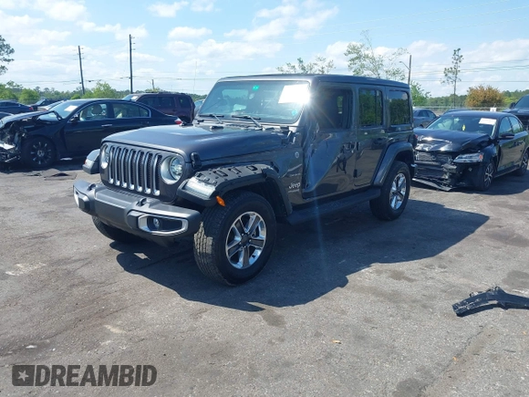 2022 Jeep Wrangler Unlimited Sahara with VIN 1C4HJXEN2NW194502, listed as a IAAI auction lot 42002455 with 34,861 mi miles and . Bid and sale history available at DreamBid. Image 2.