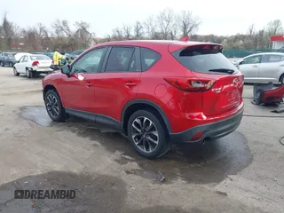 2016 Mazda CX-5 Grand Touring with VIN JM3KE4DY9G0865780, listed as a IAAI auction lot 41913914 with 76,579 mi miles. Bid and sale history available at carsss.com. Image 3.